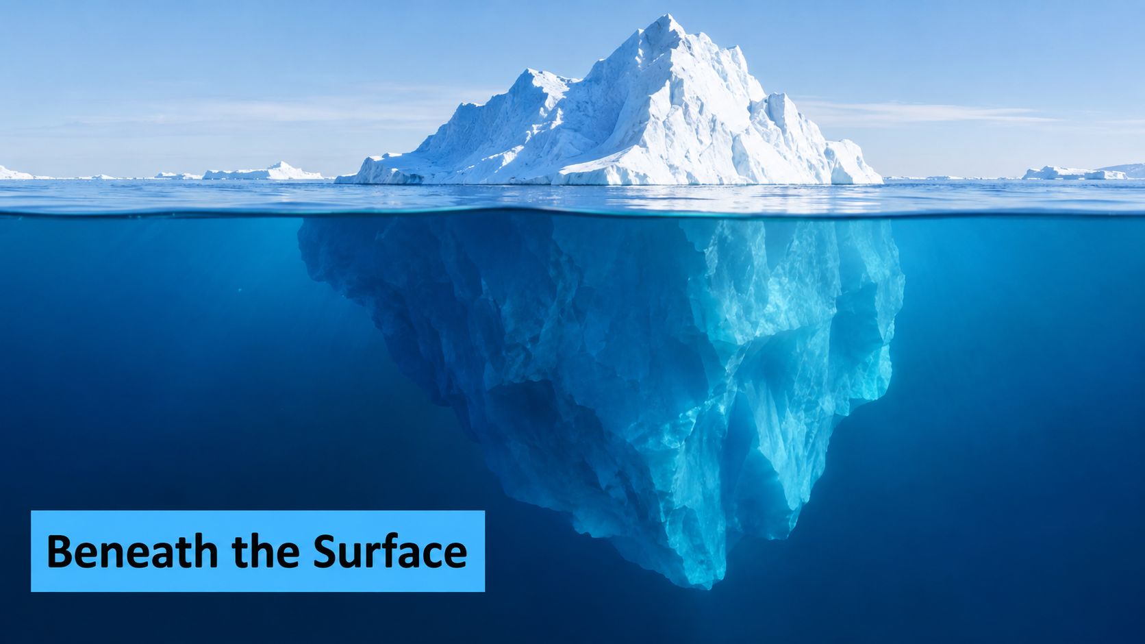 A large iceberg floating in the deep blue ocean, partially submerged, symbolizing depth and hidden perspectives.