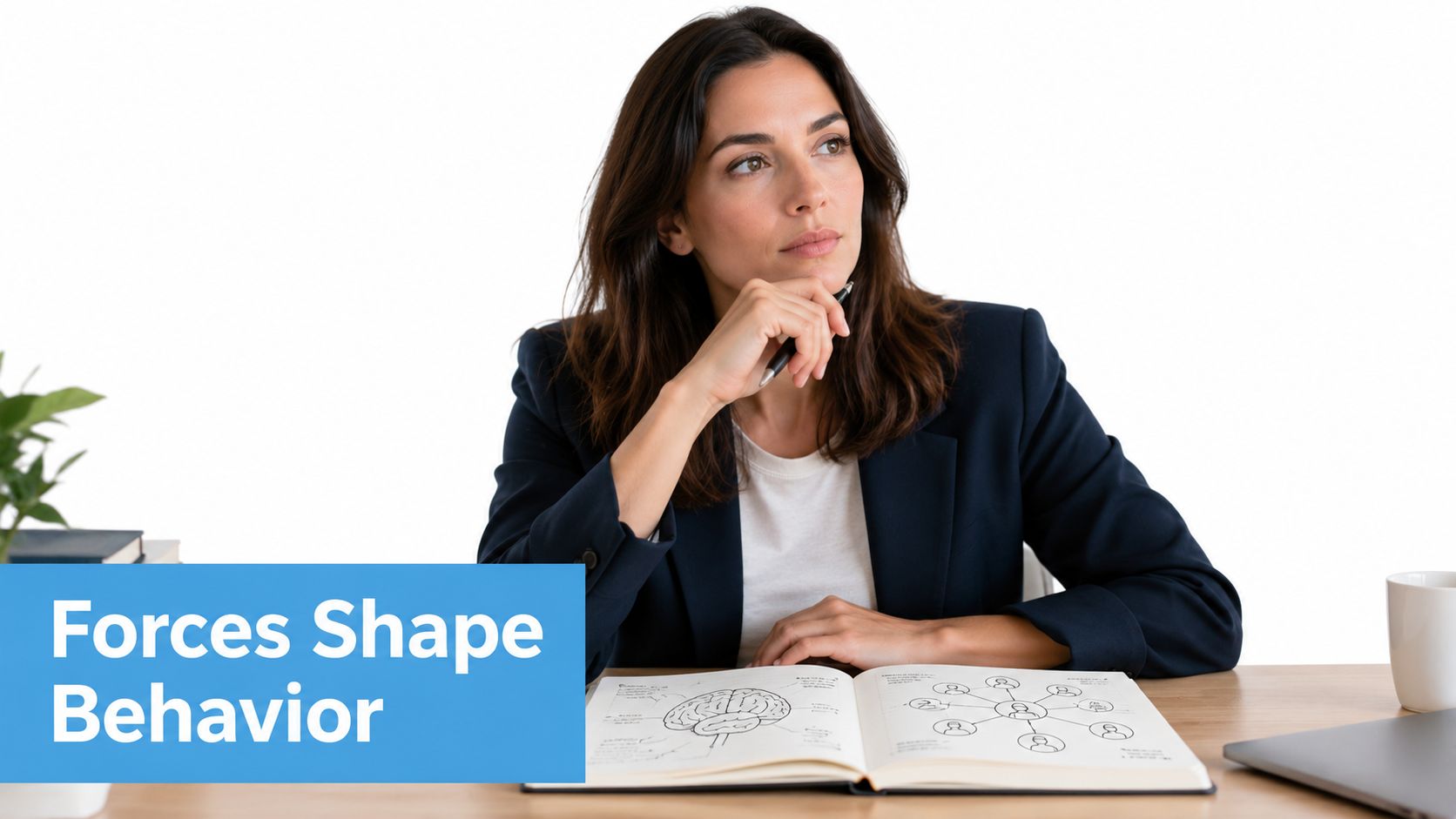 A businesswoman thinking while looking at a diagram of a brain and human connections in a notebook.